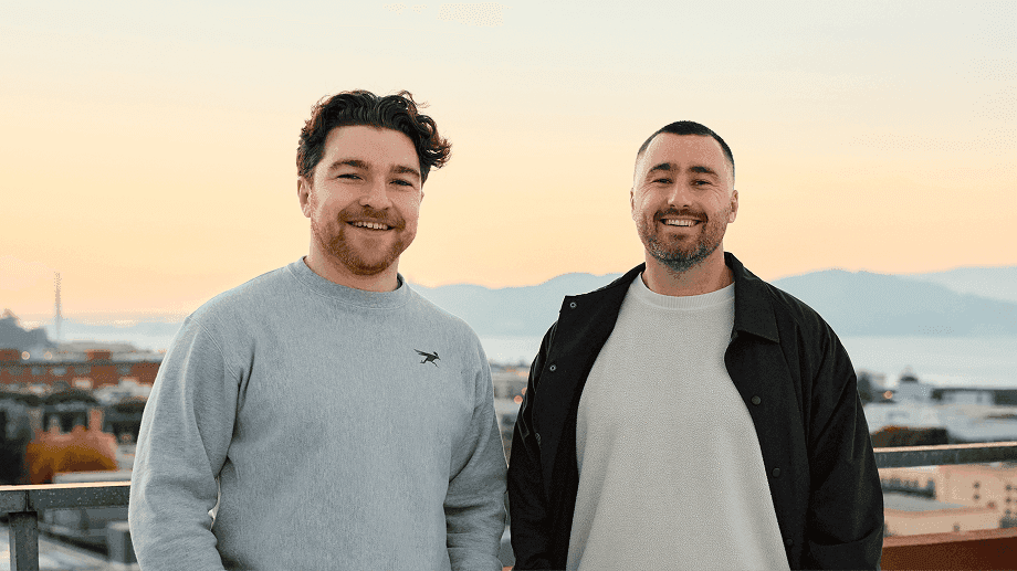 Solidroad's founders on a rooftop in San Francisco at sunset